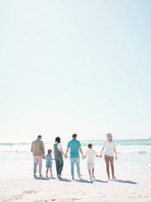 Big family, beach and summer vacation on mockup in travel, outdoor holiday or together on sunny day