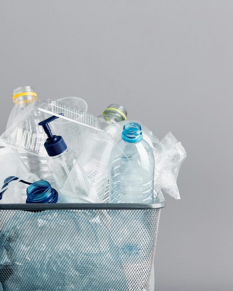 Heap of plastic bottles, cups, bags. Plastic pollution. Plastic waste. Environment damage